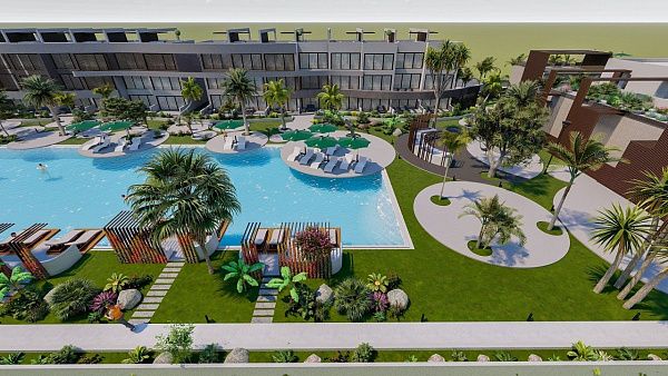 Квартира 2+1(70м2 ) с большой террасой и собственным садом в новом комплексе в Искеле